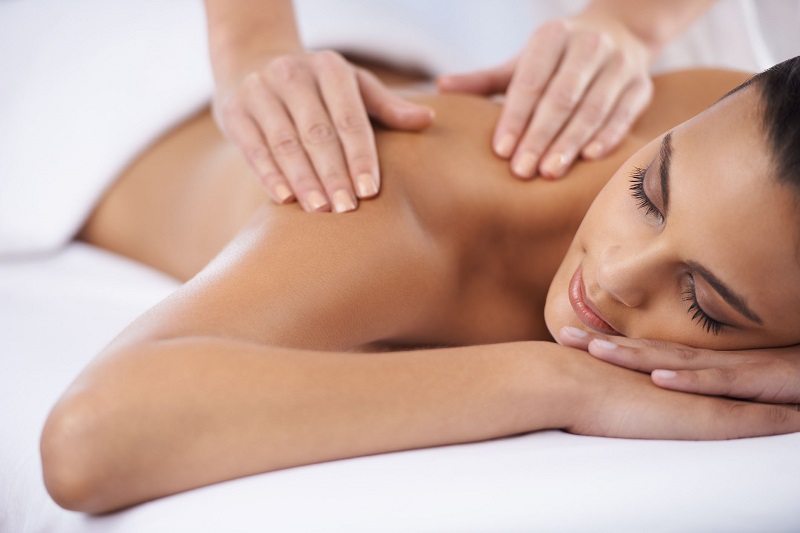 Ridding myself of some tension A young woman receiving a massage from a massage professional
